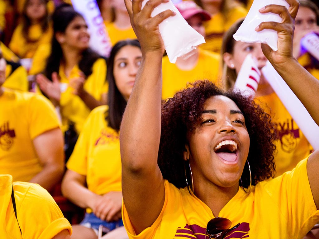 students cheering at a welcome event