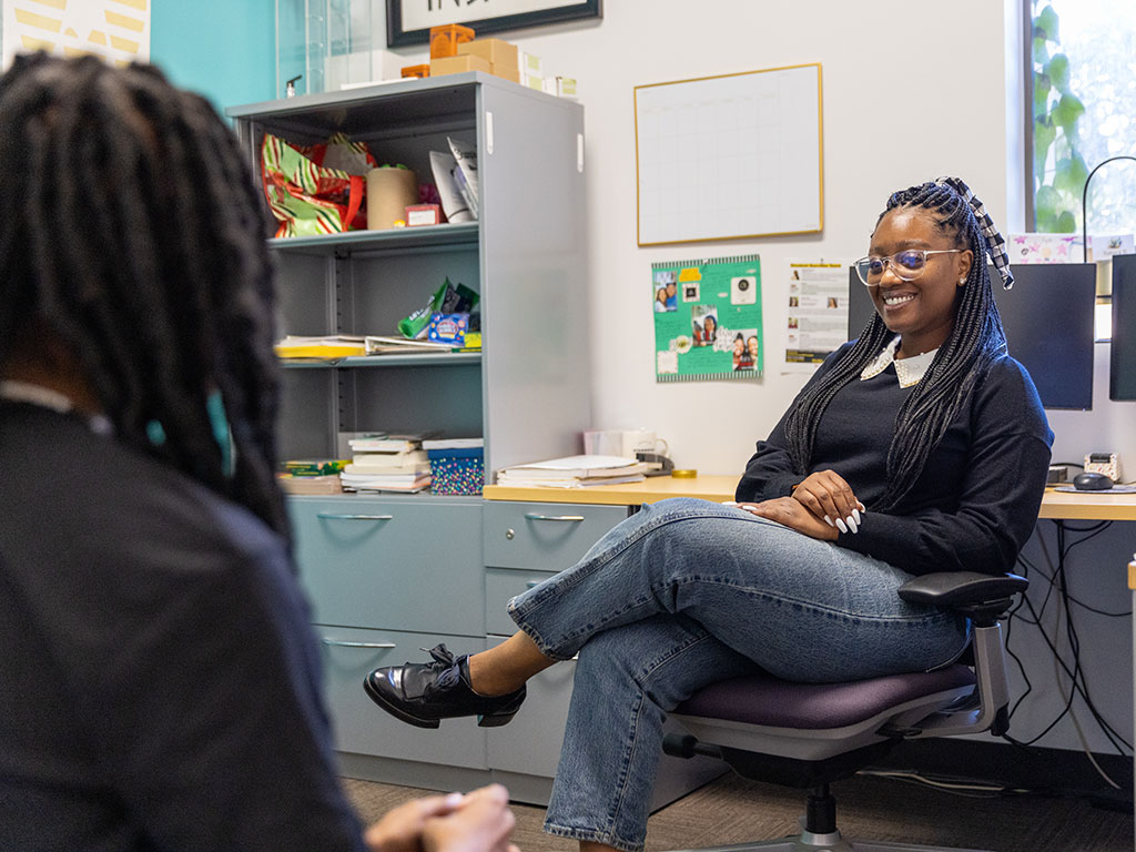 wellness coach talking with a student